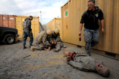 US Navy 120112-N-GO179-026 participate in the tactical combat casualty care training program photo