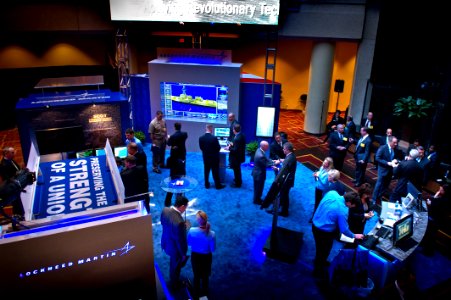 US Navy 120110-N-MG658-021 Visitors to the 24th Annual Surface Navy Association Symposium visit the Lockheed Martin booth