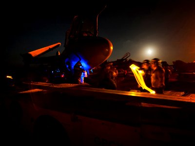 US Navy 120111-N-DR144-017 Flight deck personnel prepare to move an EA-6B Prowler on the flight deck aboard the Nimitz-class aircraft carrier USS C
