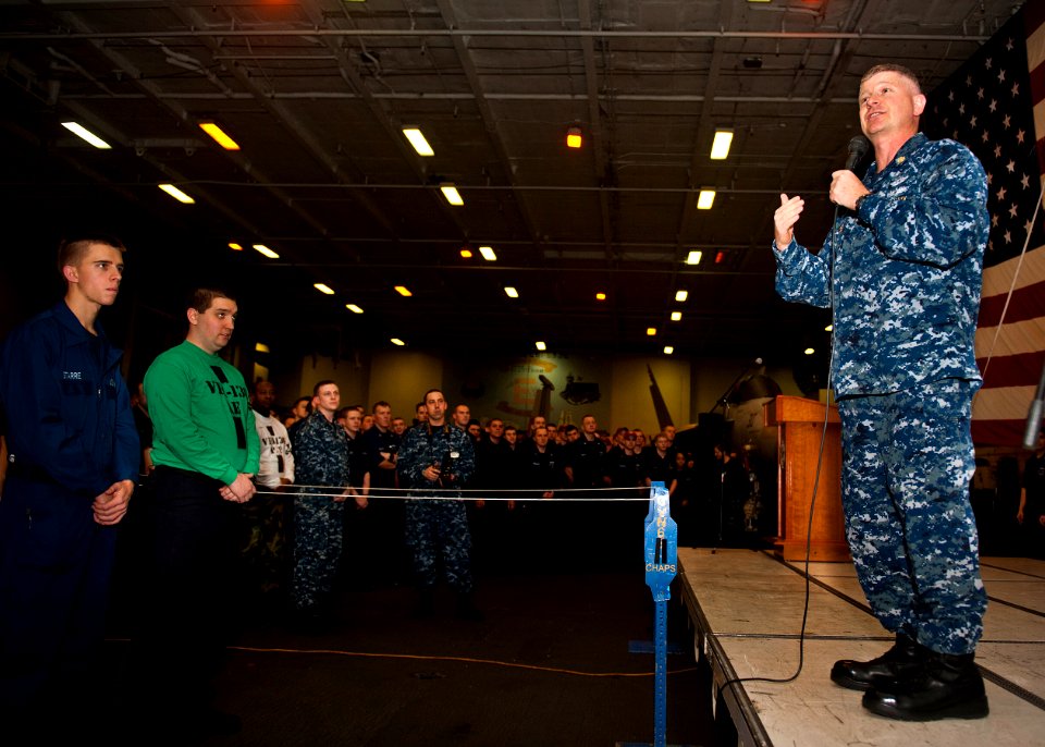 US Navy 120112-N-FI736-007 Master Chief Petty Officer of the Navy (MCPON)Rick D. West speaks to Sailors during an all-hands call aboard the aircraf