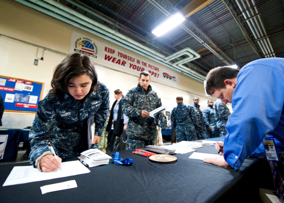 US Navy 120117-N-NR955-006 A Sailor signs up for information for civilian positions