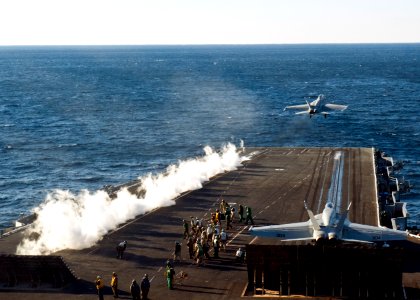 US Navy 120114-N-FI736-163 A jet takes off from the flight deck