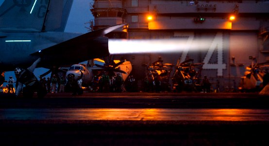 US Navy 120115-N-OY799-337 An F-A-18F Super Hornet from the Black Aces of Strike Fighter Squadron (VFA) 41 launches off the flight deck of the Nimi