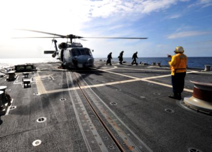 US Navy 120117-N-NL401-015 Rear Adm. Dennis E. FitzPatrick, commander of Strike Force Training Atlantic, arrives aboard the Arleigh Burke-class gui