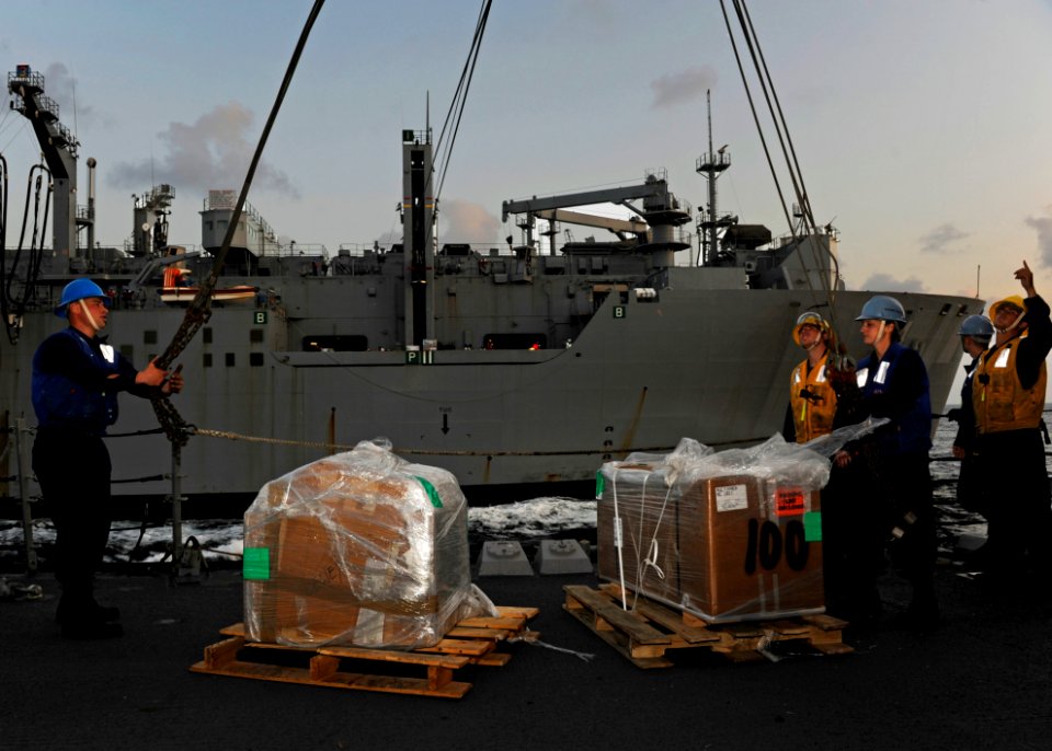 US Navy 120116-N-VH839-010 Sailors aboard the Arleigh Burke-class guided-missile destroyer USS Dewey (DDG 105) detach the spanner wire from two inc