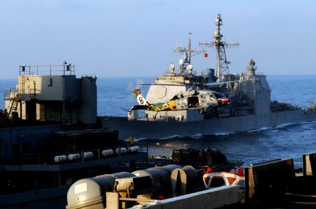 US Navy 120113-N-RG587-046 An MH-60S Sea Hawk helicopter assigned to Helicopter Sea Combat Squadron (HSC) 8 delivers supplies