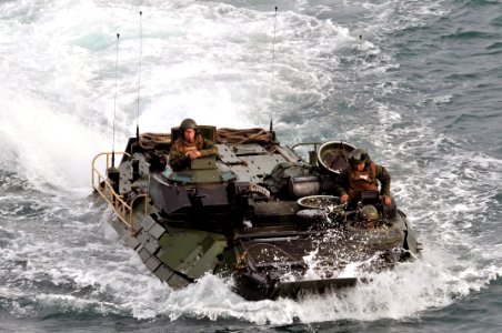 US Navy 120117-N-UM734-240 Marines aboard an amphibious assault vehicle approach the well deck of the amphibious assault ship USS Kearsarge (LHD 3)