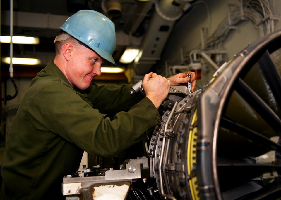 US Navy 120118-N-FI736-115 Cpl. William Gillespie, assigned to the Thunderbolts of Marine Fighter Attack Squadron (VMFA) 251, removes test gear fro