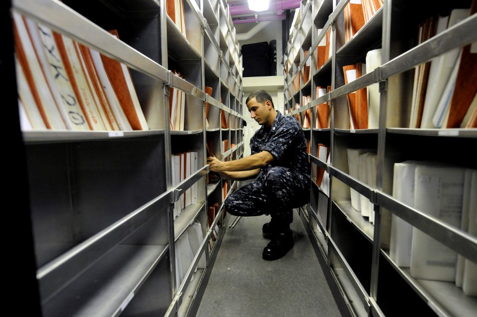 US Navy 120119-N-RG587-120 Aviation Boatswain's Mate (Equipment) 1st Class Jonnie Morales, assigned to the engineering department aboard the Nimitz