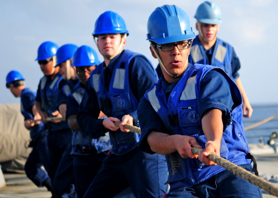 US Navy 120119-N-ZF681-161 Sailors aboard the guided-missile destroyer USS Halsey (DDG 97) heave a fuel line
