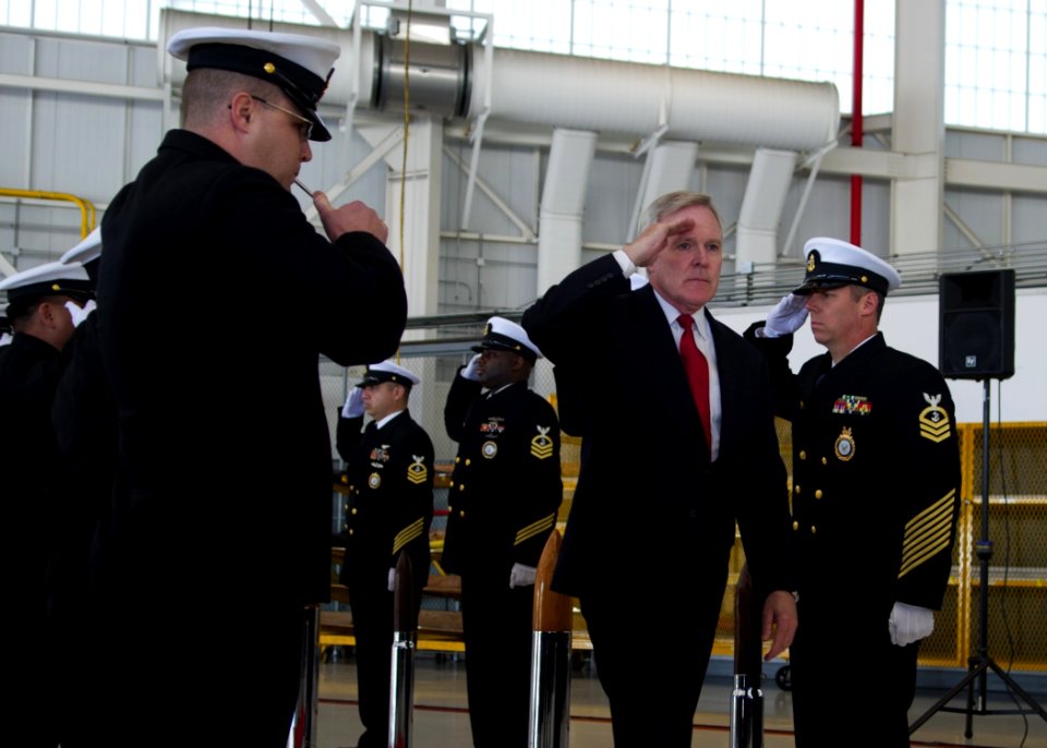 US Navy 120117-N-AC887-493 Secretary of the Navy (SECNAV) the honorable Ray Mabus passes through sideboys before presenting retired Chief Petty Off