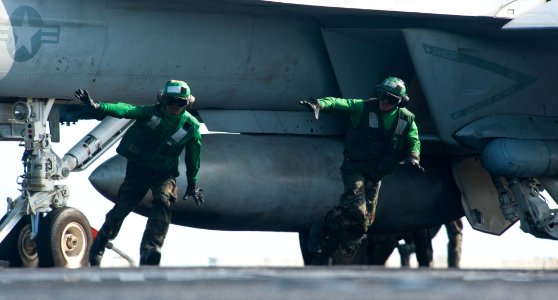 US Navy 120117-N-OY799-165 Aviation Boatswain's Mate (Equipment) Airman Joe Villanueva and Aviation Boatswain's Mate (Equipment) 3rd Class Carl Mil