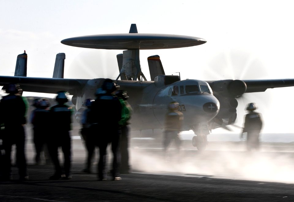 US Navy 120118-N-DR144-191 An E-2C Hawkeye assigned to the Tigertails of Carrier Airborne Early Warning Squadron (VAW) 125 recovers on the flight d