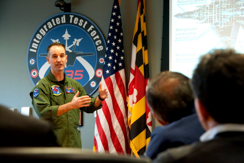 US Navy 120120-D-BW835-022 Secretary of Defense Leon E. Panetta receives a brief from Captain (USN) Erik