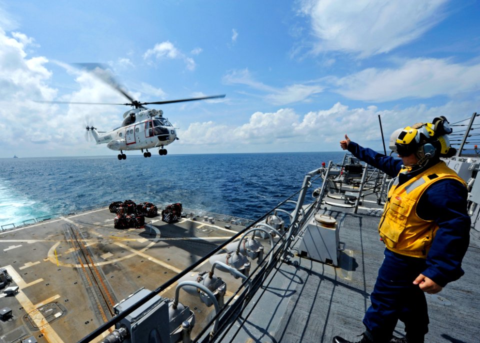 US Navy 120124-N-VH839-038 Boatswain's Mate 3rd Class Kristin Butts, a landing signalman aboard the Arleigh Burke-class guided-missile destroyer U