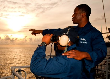 US Navy 120124-N-FI736-001 Sailors scan the horizon for surface contacts while on watch aboard the aircraft carrier USS Enterprise (CVN 65)