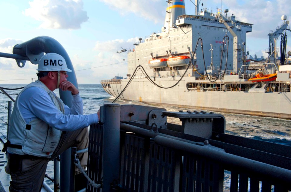 US Navy 120121-N-VY256-181 Chief Boatswain's Mate Loren Heaton oversees a refueling aboard the Ticonderoga-class guided-missile cruiser USS Cape St