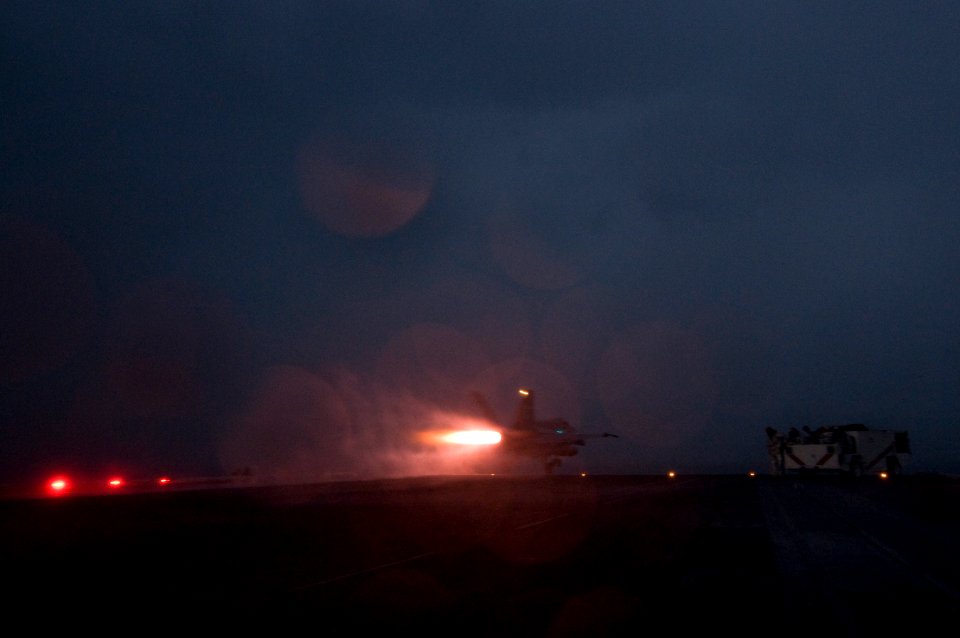 US Navy 120121-N-TZ605-148 A jet launches from the flight deck