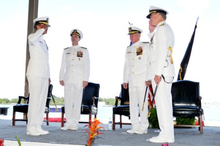 US Navy 120120-N-IT566-219 Adm. Cecil Haney, left, salutes Adm. Patrick M. Walsh as Haney relieves Walsh as U.S. Pacific Fleet commander photo