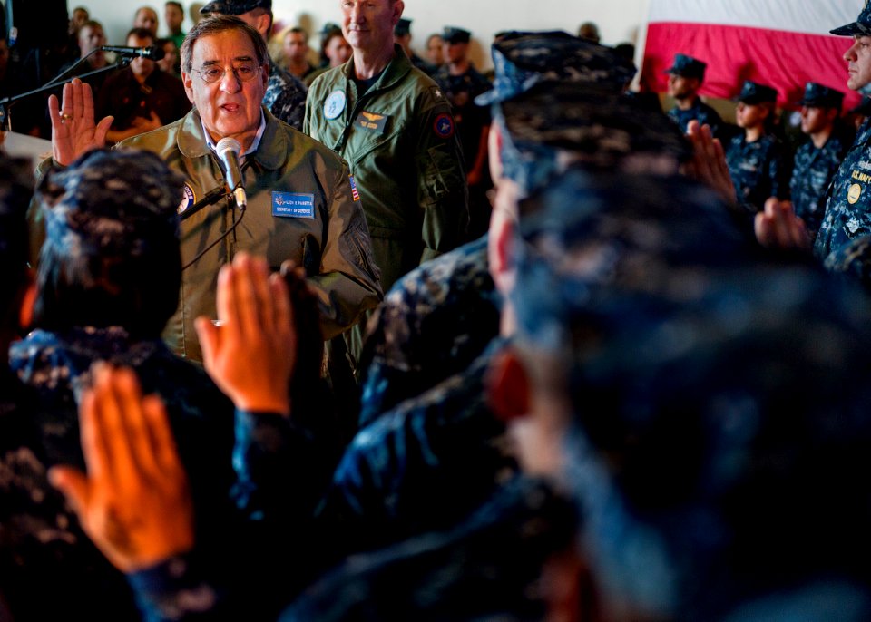 US Navy 120121-N-FI736-281 Secretary of Defense Leon E. Panetta re-enlists 21 Sailors aboard the aircraft carrier USS Enterprise (CVN 65)