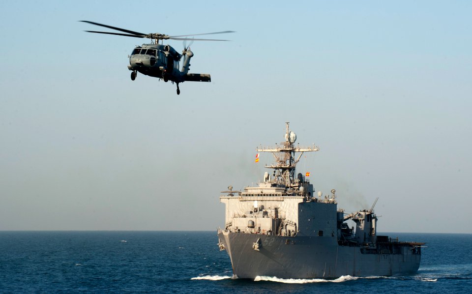 US Navy 120129-N-PB383-306 An MH-60 Sea Hawk helicopter embarked aboard the Military Sealift Command dry cargo and ammunition ship USNS Charles Dre