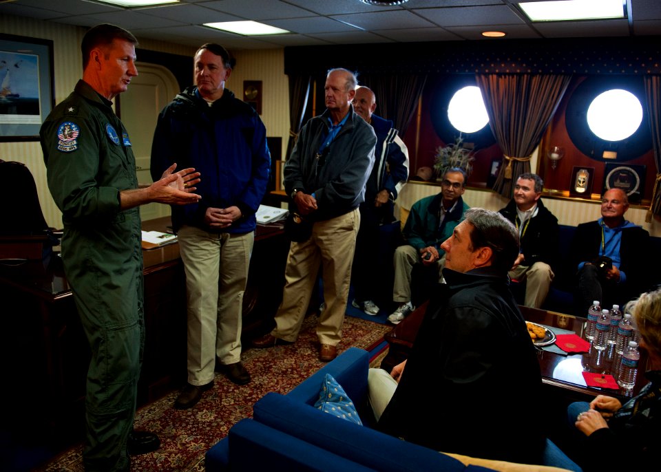 US Navy 120128-N-FI736-141 Rear Adm. Walter E. Carter, commander of Carrier Strike Group (CSG) 12, speaks to visitors during a tour aboard the airc
