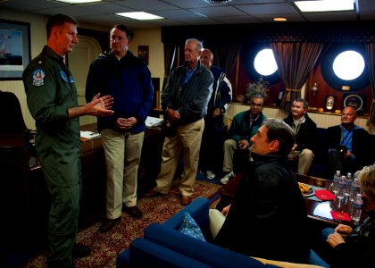 US Navy 120128-N-FI736-141 Rear Adm. Walter E. Carter, commander of Carrier Strike Group (CSG) 12, speaks to visitors during a tour aboard the airc