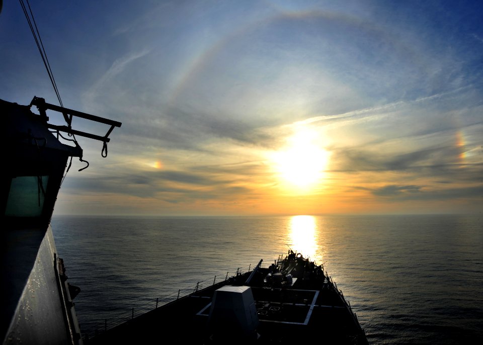 US Navy 120125-N-NL401-497 The sun sets over the foc'sle of the Arleigh Burke-class guided-missile destroyer USS James E. Williams (DDG 95)