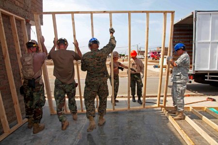 US Navy 120127-A-IP644-018 Marines and Seabees embarked aboard High Speed Vessel (HSV 2) Swift work with Peruvian navy combat engineers to refurbis