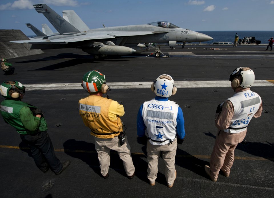 US Navy 120130-N-DR144-561 Cal Vinson Leadership observe operations on the flight deck aboard the Nimitz-class aircraft carrier USS Carl Vinson (CV