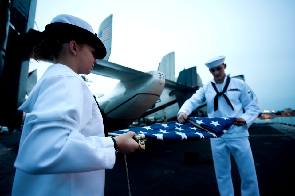 US Navy 120128-N-OY799-059 Aviation Boatswain's Mate (Equipment) Airman Dannielle Byrum and Aviation Boatswain's Mate (Handling) Airman Nehemiah Ul