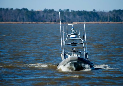 US Navy 120131-N-DU438-542 A U.S. Navy Sea Fox remote-controlled five-meter rigid hull inflatable boat prepares to intrude on an area patrolled by