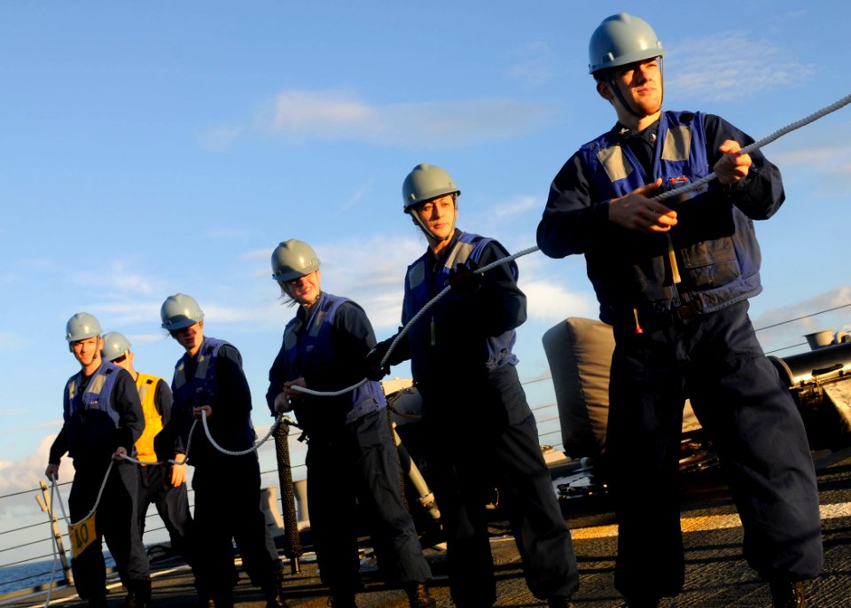 US Navy 120128-N-OH194-002 Sailors handle lines during an underway replenishment aboard the guided missile destroyer USS Wayne E. Meyer (DDG 108)