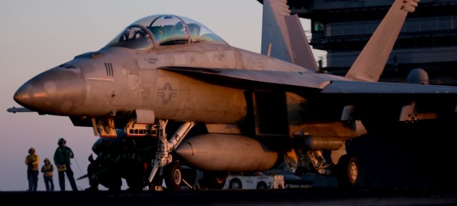 US Navy 120126-N-TZ605-437 An F-A-18F Super Hornet assigned to Strike Fighter Squadron (VFA) 22 prepares to launch on the flight deck aboard the Ni