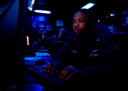 US Navy 120128-N-FI736-887 Air Traffic Controller 3rd Class Tyrell Little stands watch aboard the aircraft carrier USS Enterprise (CVN 65) photo