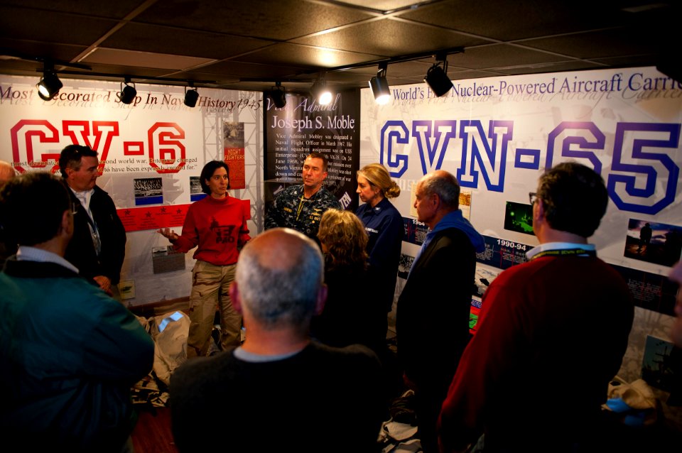 US Navy 120128-N-FI736-692 Lt. Cmdr. Sarah Self-Kyler, the public affairs officer aboard the aircraft carrier USS Enterprise (CVN 65), explains the