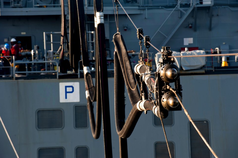 US Navy 120129-N-PB383-280 A double-probed fuel hose from the Military Sealift Command dry cargo and ammunition ship USNS Charles Drew (T-AKE 10) a