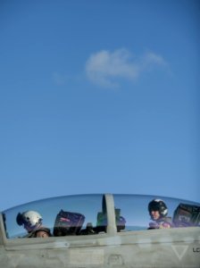 US Navy 120130-N-DR144-110 Pilots prepare to launch in an F-A-18F Super Hornet assigned to Strike Fighter Squadron (VFA) 22 on the flight deck aboa