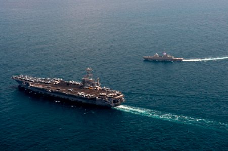 US Navy 120130-N-BT887-147 The Nimitz-class aircraft carrier USS John C. Stennis (CVN 74) and Republic of Singapore Navy frigate RSS Stalwart (72)
