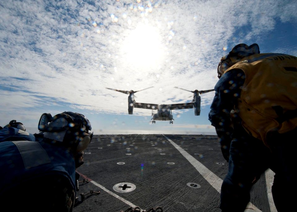 US Navy 120131-N-NR955-119 An Osprey helicopter lands on the flight deck