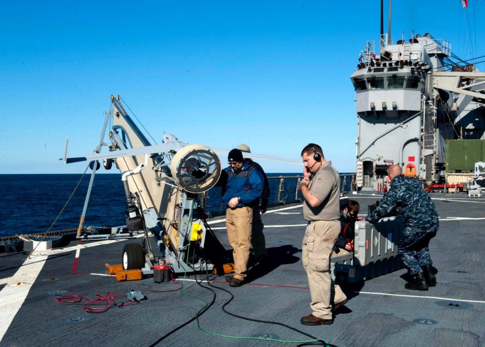 US Navy 120130-N-NR955-046 Insitu and Boeing contractors prepare the unmanned aerial vehicle Scan Eagle for a test flight from the flight deck aboa