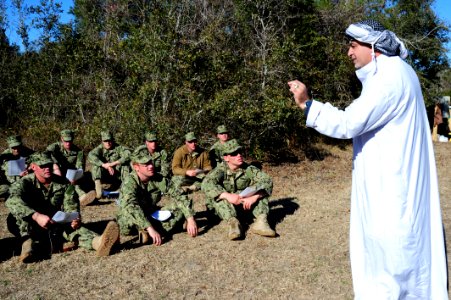 US Navy 120130-N-QD416-057 Satar Alrubai, a subject matter expert with Defense Training Systems, conducts a cultural awareness class with members o