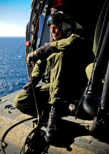 US Navy 120131-N-YM590-148 A Sailor scans the horizon