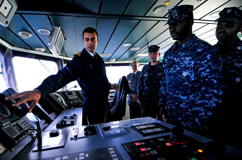 US Navy 120202-N-IZ292-154 Royal Moroccan Naval Ensign Nabil Elkorchi gives a briefing to Sailors from the guided-missile frigate USS Simpson (FFG