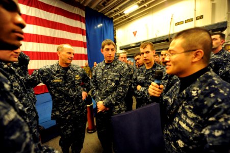 US Navy 120204-N-WL435-519 Chief of Naval Operations (CNO) Adm. Jonathan Greenert holds an all-hands call with Sailors and Marines aboard the amphi photo
