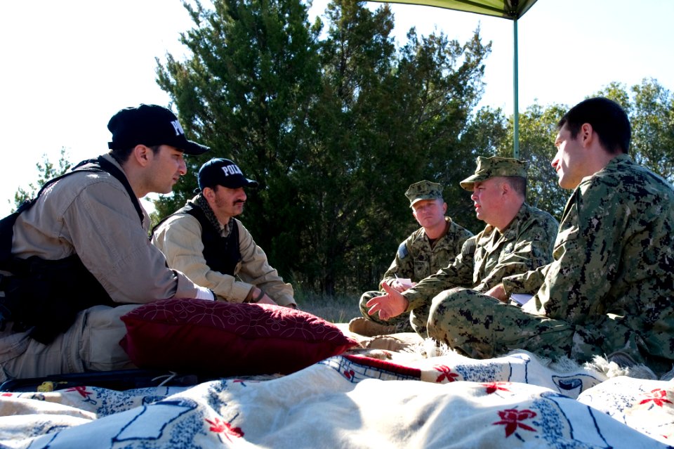 US Navy 120201-N-YX920-037 Sailors perform a key leader engagement with simulated host nationals during Bold Alligator 2012