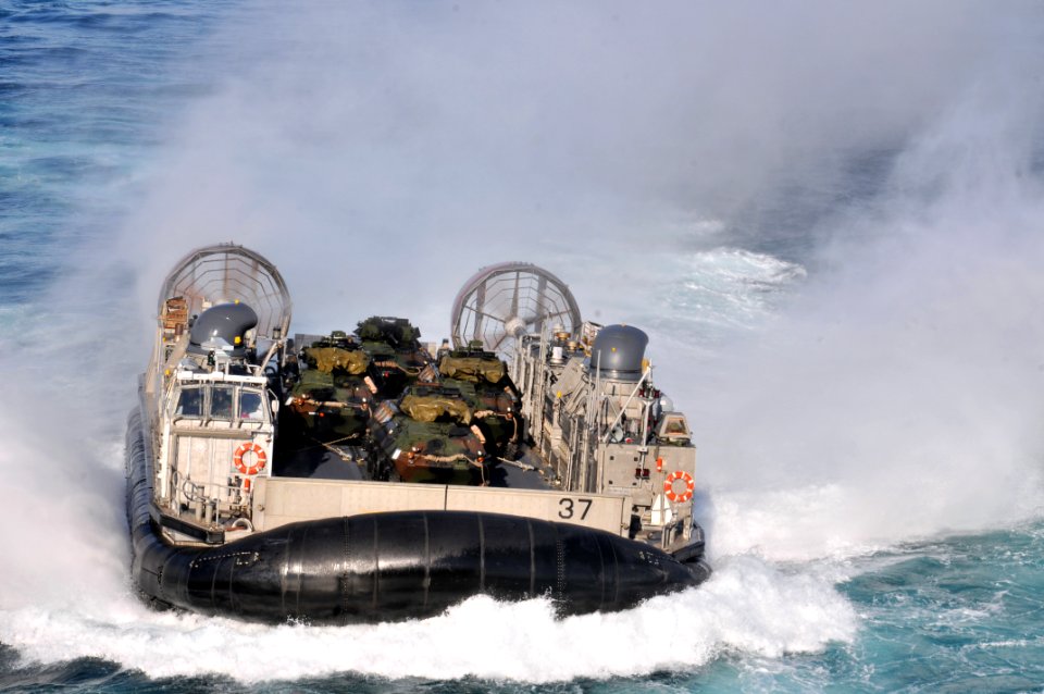 US Navy 120202-N-UM734-806 A landing craft air cushion approaches the welldeck of the amphibious assault ship USS Kearsarge (LHD 3) during Bold All