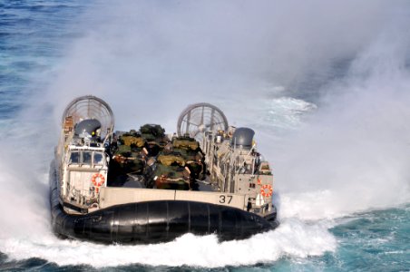 US Navy 120202-N-UM734-806 A landing craft air cushion approaches the welldeck of the amphibious assault ship USS Kearsarge (LHD 3) during Bold All