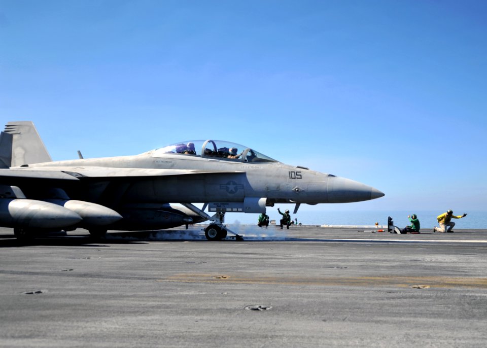 US Navy 120206-N-YB753-082 A shooter signals the launch of an F-A-18F Super Hornet assigned to the