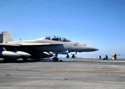 US Navy 120206-N-YB753-082 A shooter signals the launch of an F-A-18F Super Hornet assigned to the